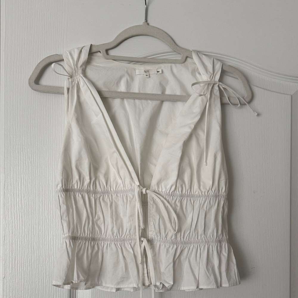 Chic White Sleeveless Top with Tie Details